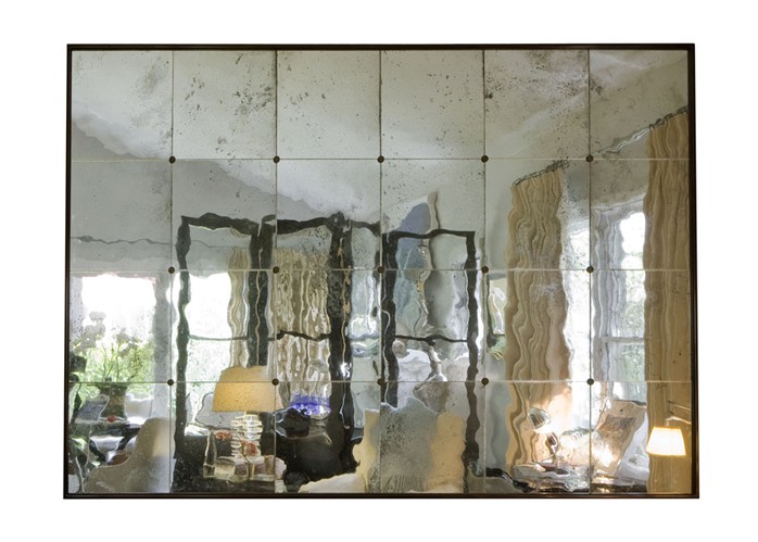 mercury paned mirror with rosettes